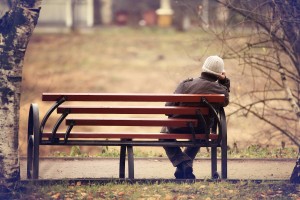 lonely man on the bench autumn, winter